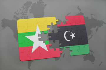 puzzle with the national flag of myanmar and libya on a world map
