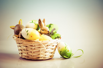 easter eggs and bunny in basket
