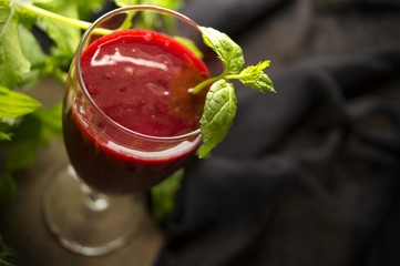 fresh strawberry juice with mint, black background