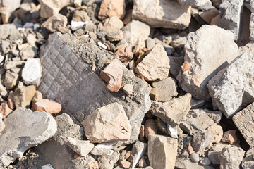 Broken bricks on construction site as background