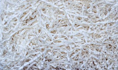 Texture and background finely shredded white paper