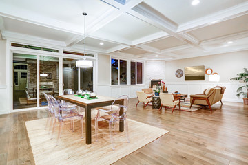 Lovely craftsman style dining space with coffered cealing