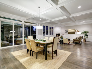 Lovely craftsman style dining space with coffered cealing