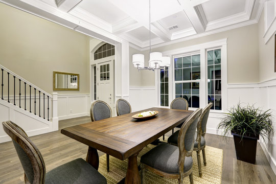 Lovely craftsman style dining room with coffered cealing
