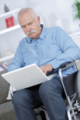 retiree using a laptop