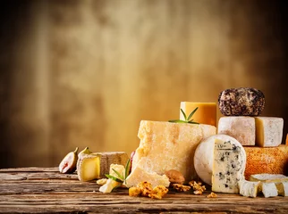  Various kind of cheese served on wood © Jag_cz