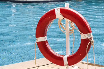 Close up of red life ring at the pool
