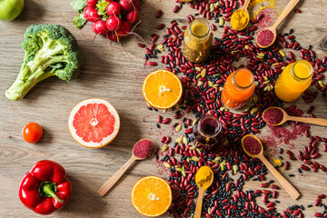 Obraz na płótnie Canvas Detox diet. Different colorful fresh juices. top view