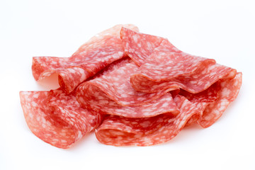 Salami smoked sausage slices isolated on white background cutout.