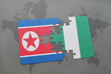 puzzle with the national flag of north korea and nigeria on a world map