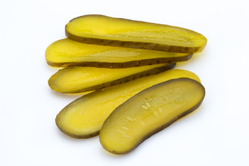 Marinated pickled cucumbers isolated on the white. © gitusik
