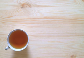 One Cup of Hot tea on the Wooden Table, Top View  