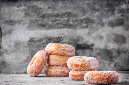 Traditional donuts with sugar topping
