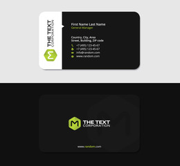 Obraz premium black business card with the letter M and green hexagon