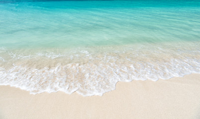 wavy sea, ocean water background on sand coast in Antigua © be free