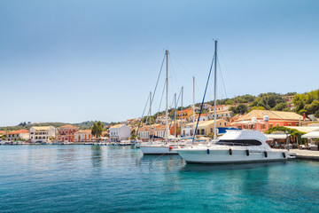 Fototapeta na wymiar Sailboats in the port of Gaios on Paxos island nearby Corfu, Greece, Europe.