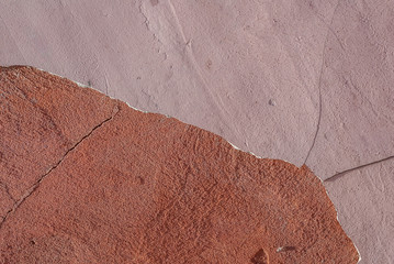 concrete wall with old plaster chipped, texture background