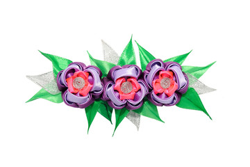 Kanzashi. Pink  and purple artificial flower isolated on white b
