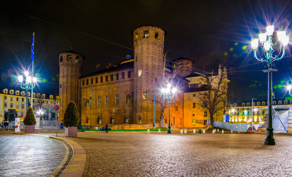 night view of the castello degli acaja castle situated on the piazza del castello in the italian city torino.
