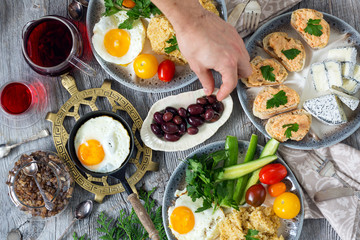 Food, healthy Breakfast, porridge, eggs, vegetables and sandwiches with caviar