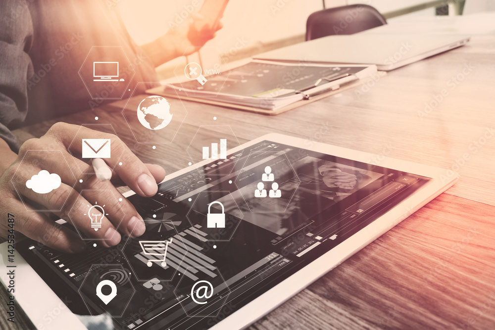 Aufkleber businessman working with smart phone and book and document on wooden desk in modern office with virtual icons interface