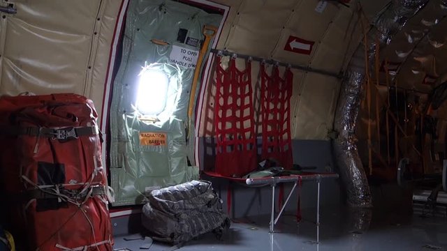 A looping background plate of an empty military cargo plane.  	
