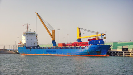 Fototapeta premium Cargo ship docked in Corpus Christi harbor, Texas