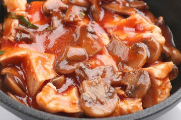Chicken cacciatore in frying pan, closeup