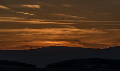 Sunset on Krusne mountains in spring evening