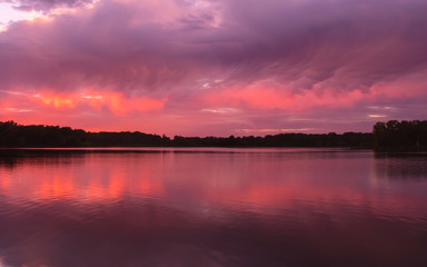 Beautiful sunset over a lake in summer time