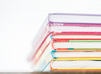 pile of books on natural background