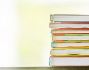 pile of books on natural background