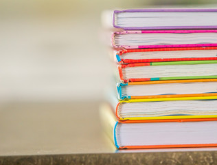 pile of books on natural background