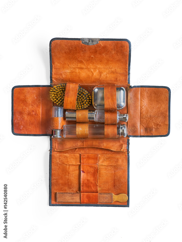 Wall mural Vintage traveler bathroom kit in leather case