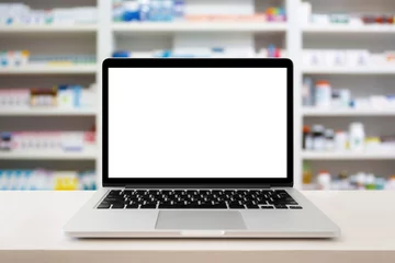 Poster de jardin Pharmacie pharmacie avec ordinateur portable sur comptoir médical