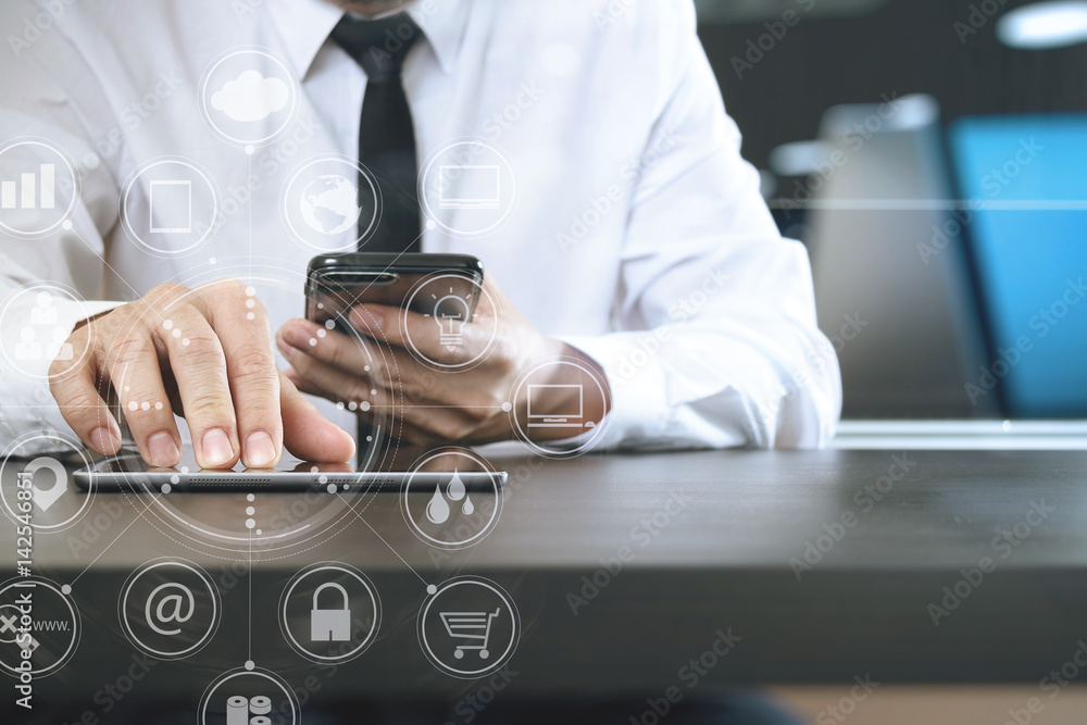 Aufkleber lawer working with smart phone and digital tablet computer in modern office