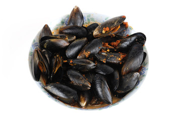 close up on fresh cooked mussel in the plate