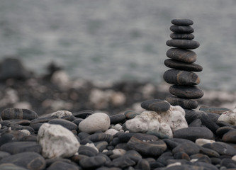 Fototapeta na wymiar Stack of round stones on small island at Lipe, Thailand.