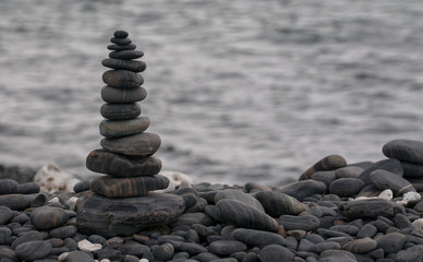 Stack of round stones on small island at Lipe, Thailand.