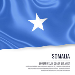Obraz na płótnie Canvas Silky flag of Somalia waving on an isolated white background with the white text area for your advert message. 3D rendering.