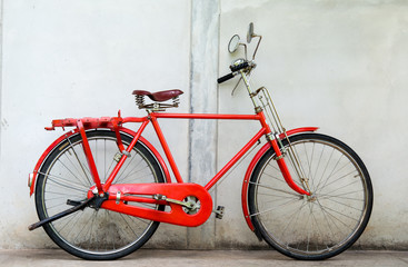 Fototapeta na wymiar Red bikecycle and wall