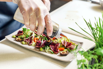 chef making salad