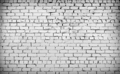 Bricks painted white, vignette. Brick wall texture or background.
