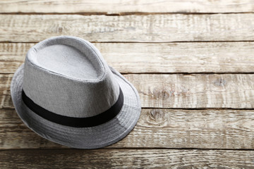 Pretty hat on a grey wooden table