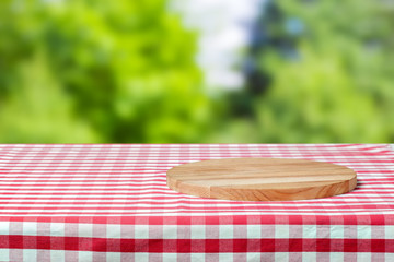 Background with tablecloth on wooden table