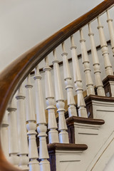 Obraz premium Curved railing and balusters of old staircase
