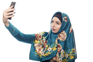 Middle Eastern or East European female proudly showing her conservative fashion via social...