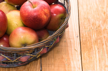Naklejka na ściany i meble Basket of apples, fresh fruits on market table