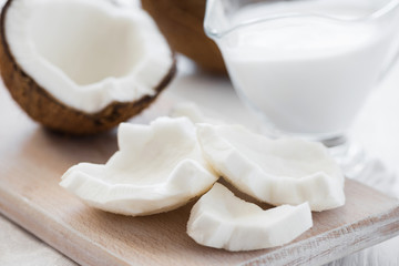 peeling fresh coconut