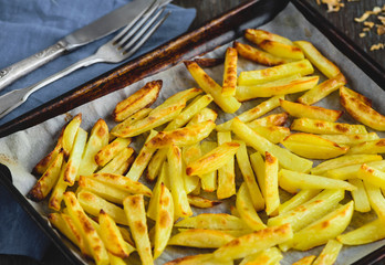 Baked potatoes on a baking sheet